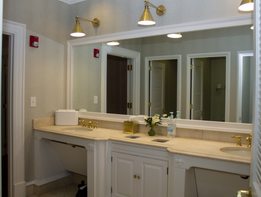 bathroom with sink vanity and mirrors